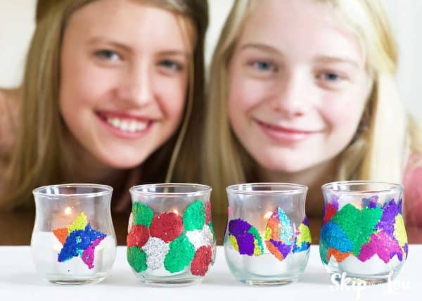 two girls with row of DIY glitter votive holders