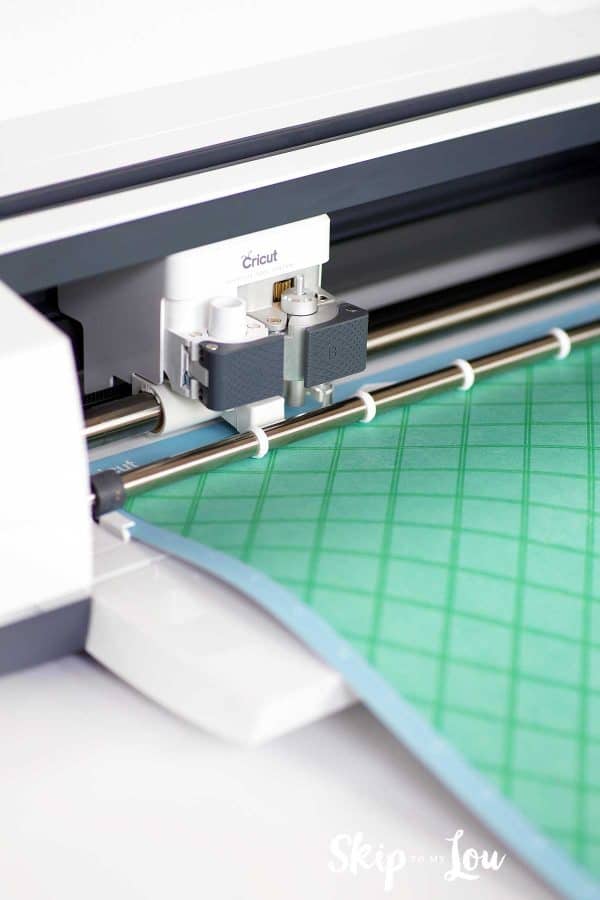 loading mat into Cricut Maker