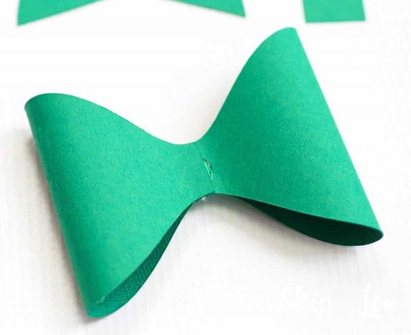 bring edges to center to form bow