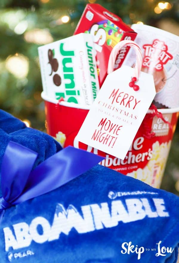 abominable blanket with popcorn bucket filled with movie candy