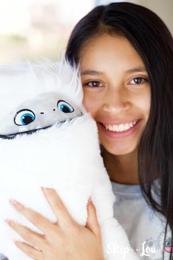child holding Abominable yeti stuffed animal