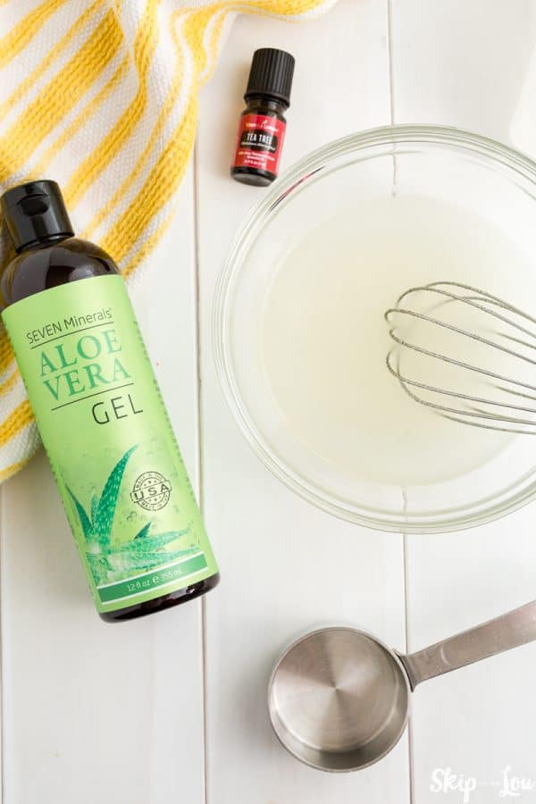 whisking ingredients together with aloe vera 