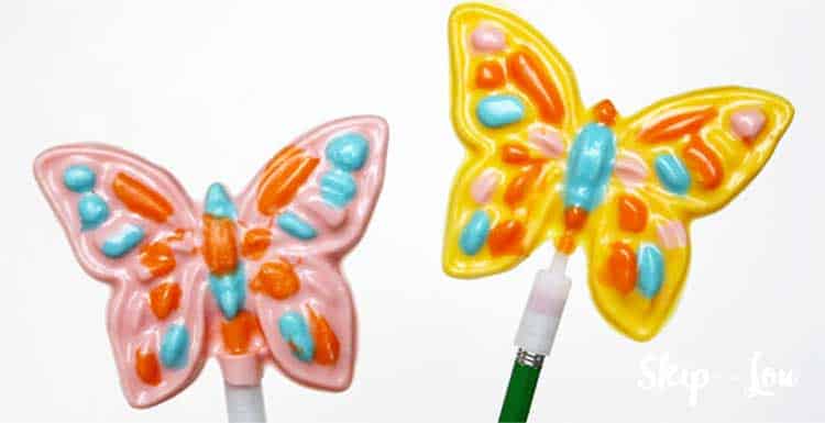 two colorful butterfly suckers make from candy melts