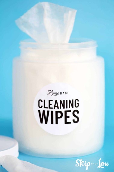 homemade cleaning wipes in container with label