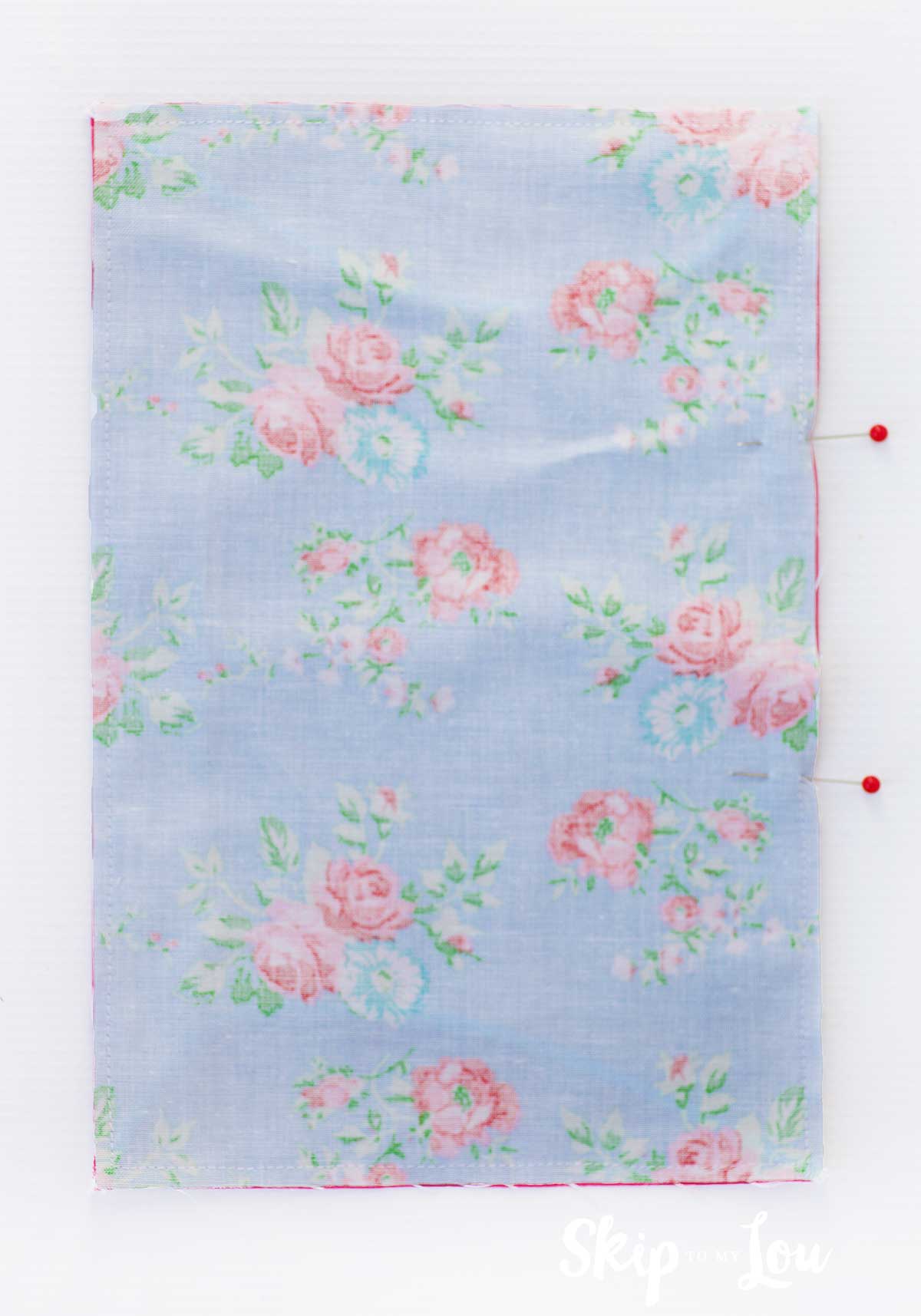 fabric right sides together sew around opening left on side marked with pins