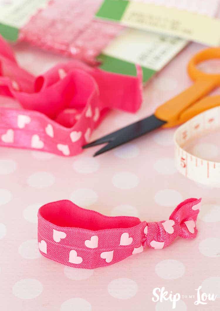 tied elastic into hair tie