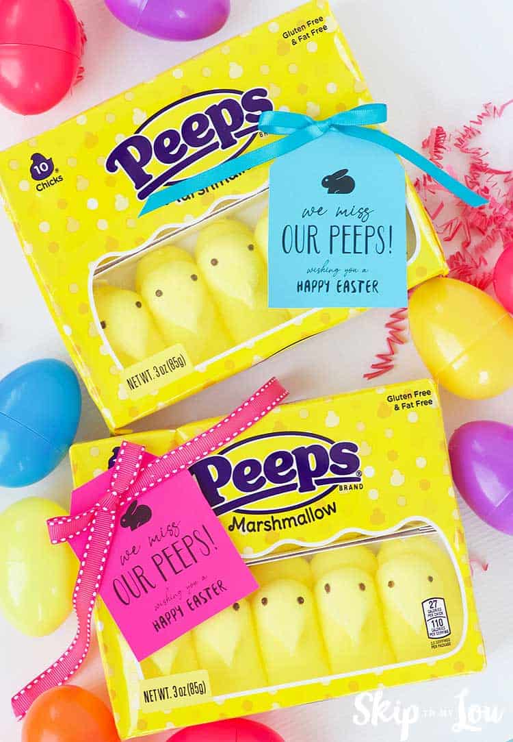 candy peeps with miss you gift tags eggs and easter grass around