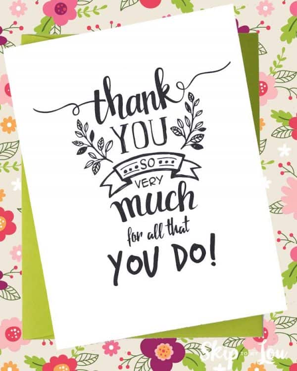 printable thank you card laying on green envelope