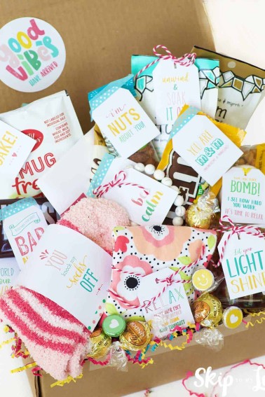 box filled with gifts says good vibes
