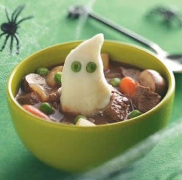 Image shows a beef stew with mashed potatoes that looks like a ghoul