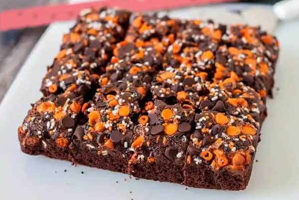 Image shows a batch of pumpkin brownies on a table