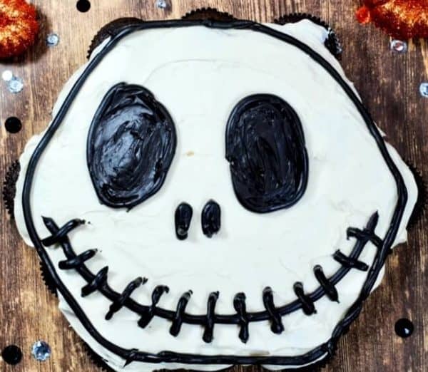 Image shows a Jack Skellington cupcake cake
