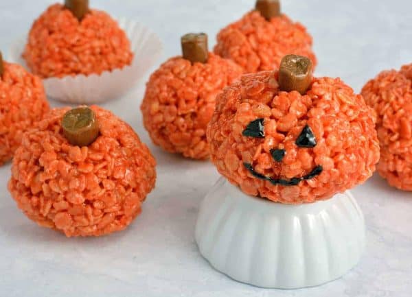 Image shows several peanut butter pumpkin rice krispie treats
