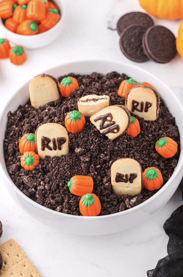 Image shows a finished graveyard chocolate cheesecake dip