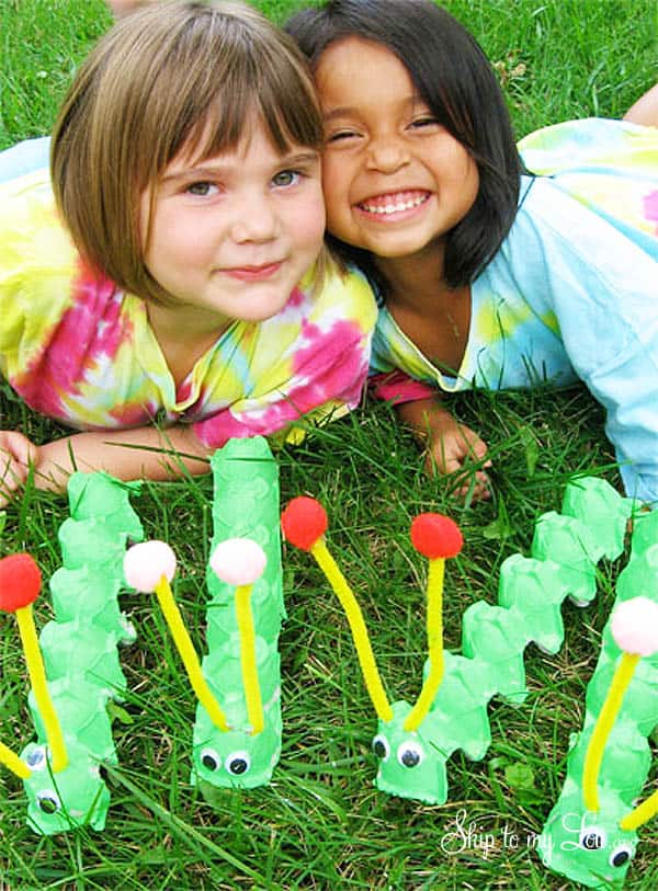 two young girls with diy caterpillars