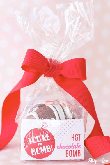 cocoa bomb in red and white Valentine's Day Packaging