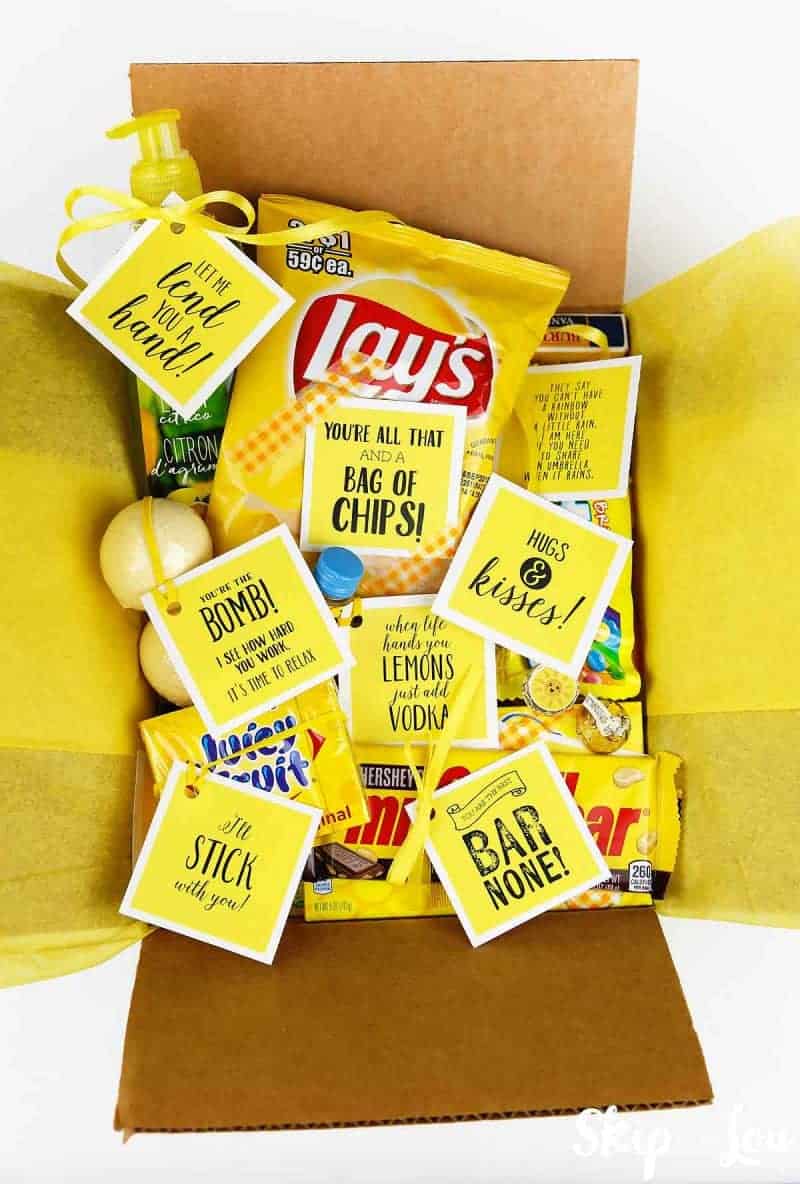 yellow items filled in box for box of sun care package