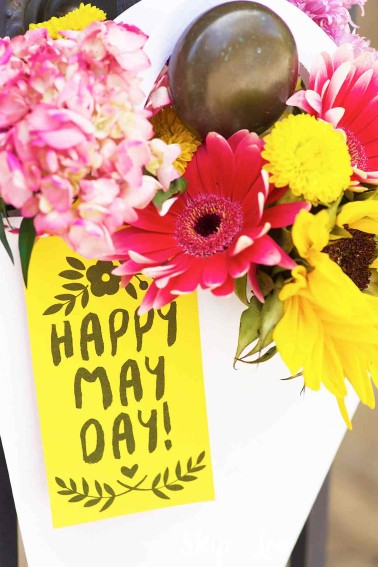 may day basket filled with flowers