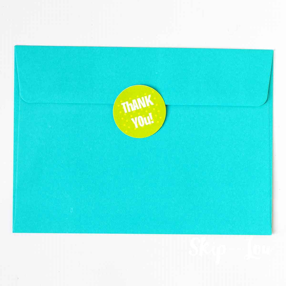 thank you sticker on back of envelope