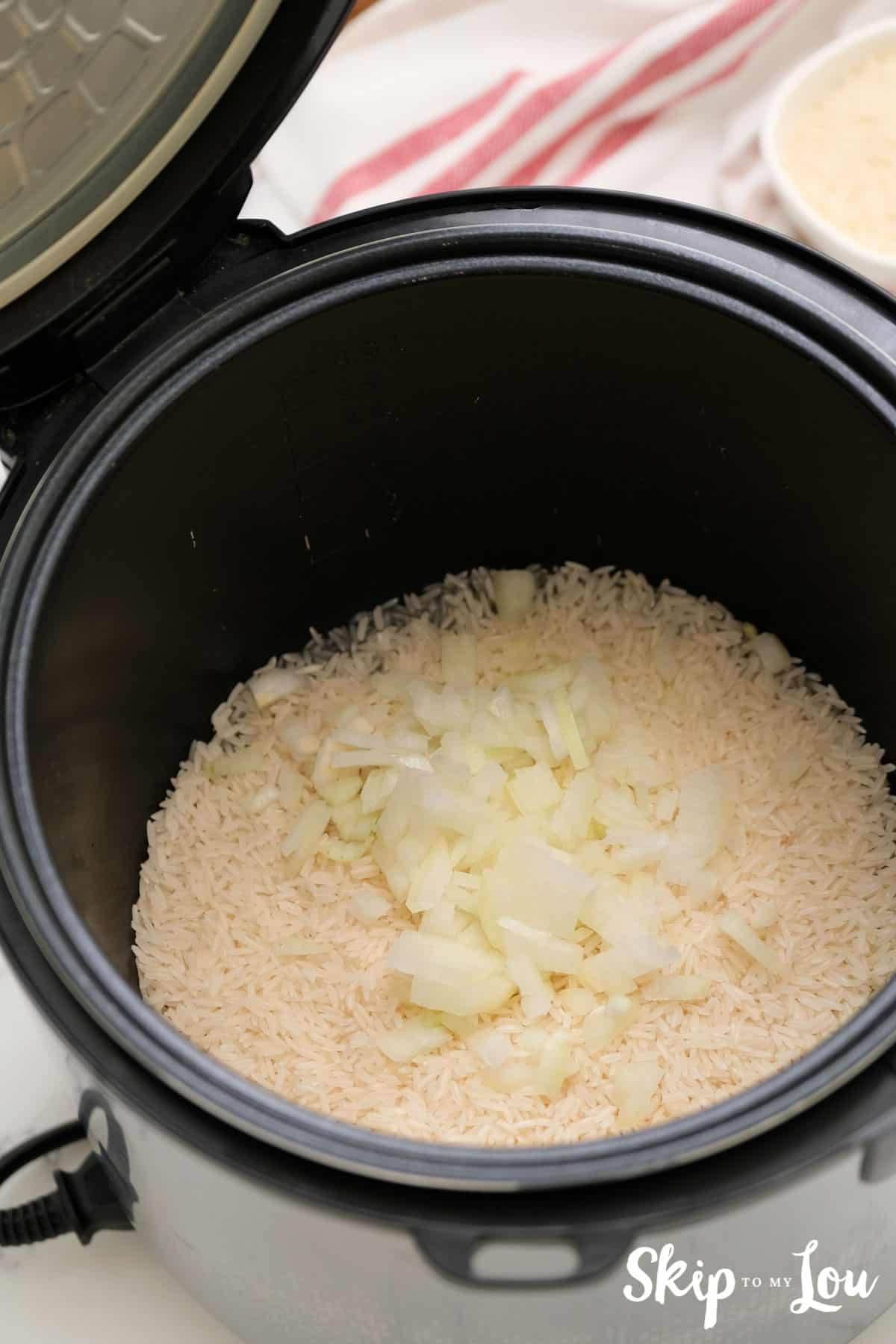 rice and onion in instant pot to brown