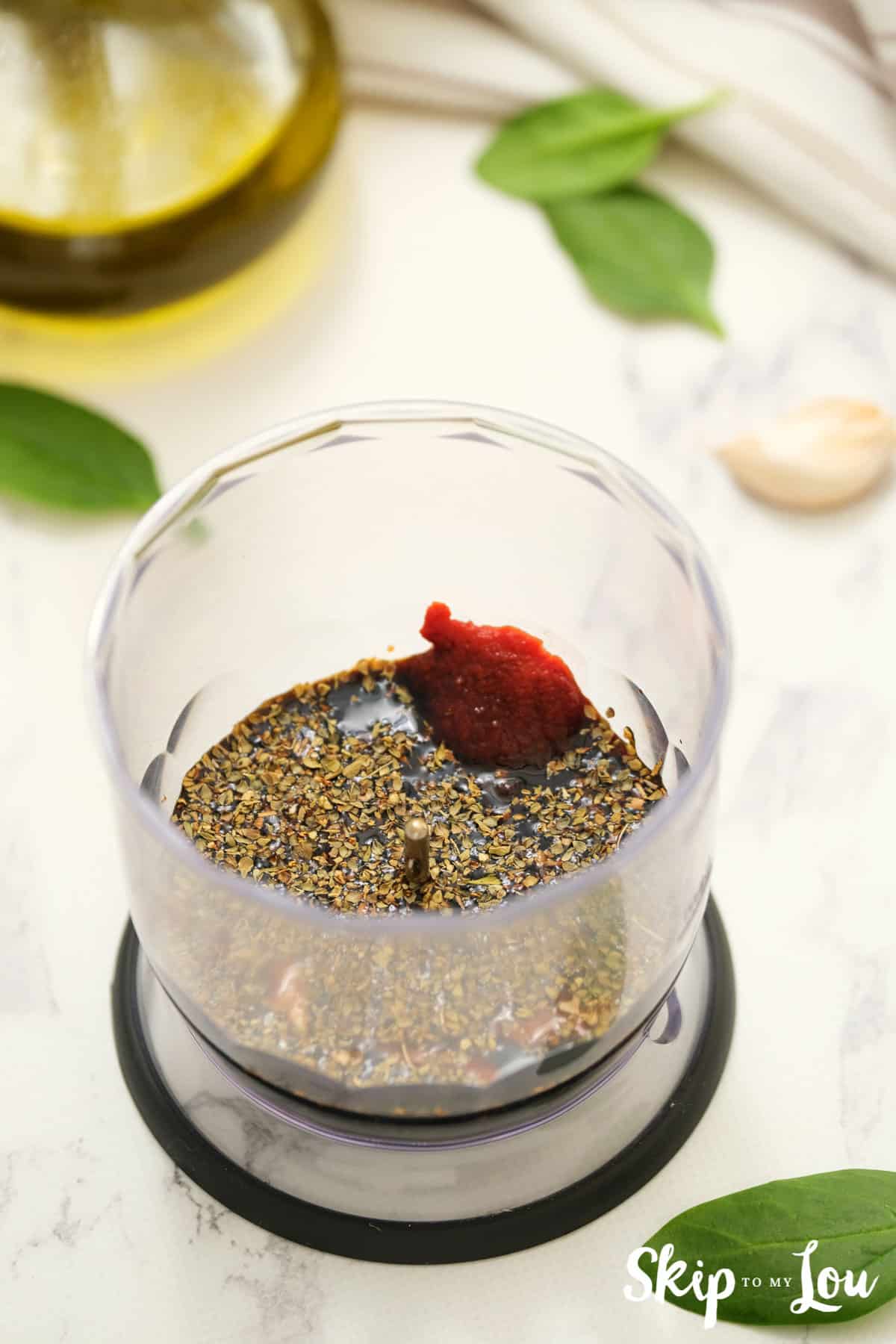 step one to make tortellini salad put ingredients in food processor or blender