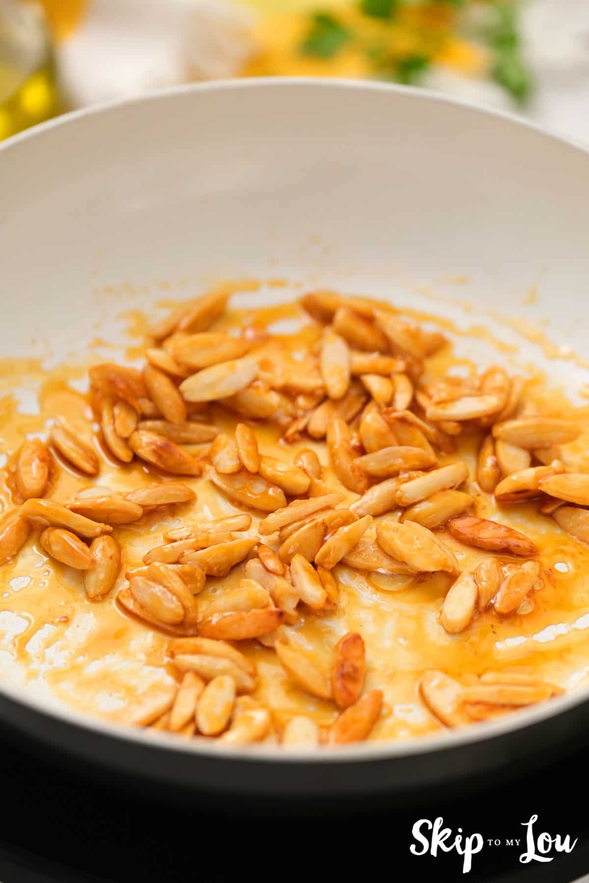 slivered almonds candied in pan for mandarin orange saled