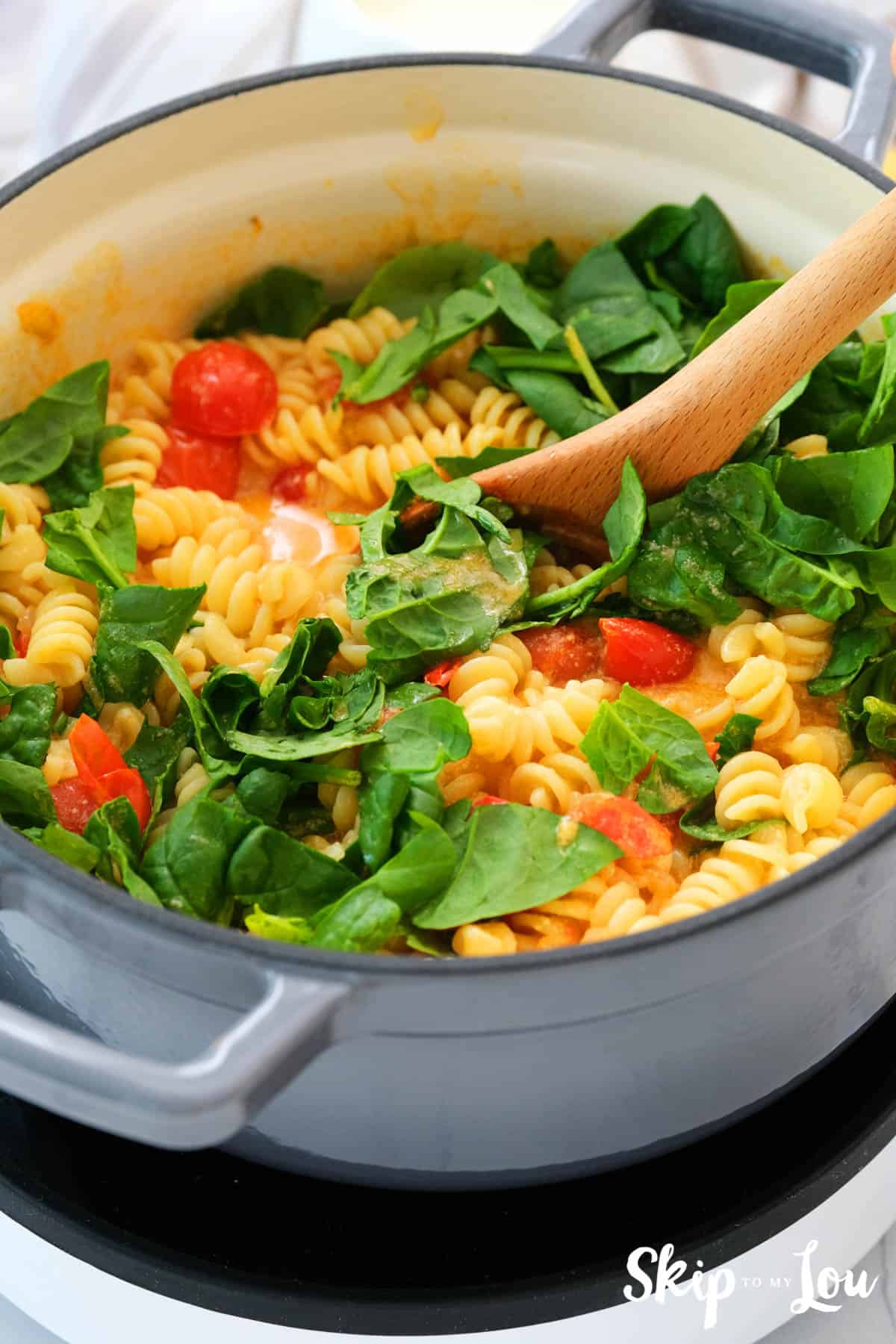 next add spinach to the creamy one pot pasta