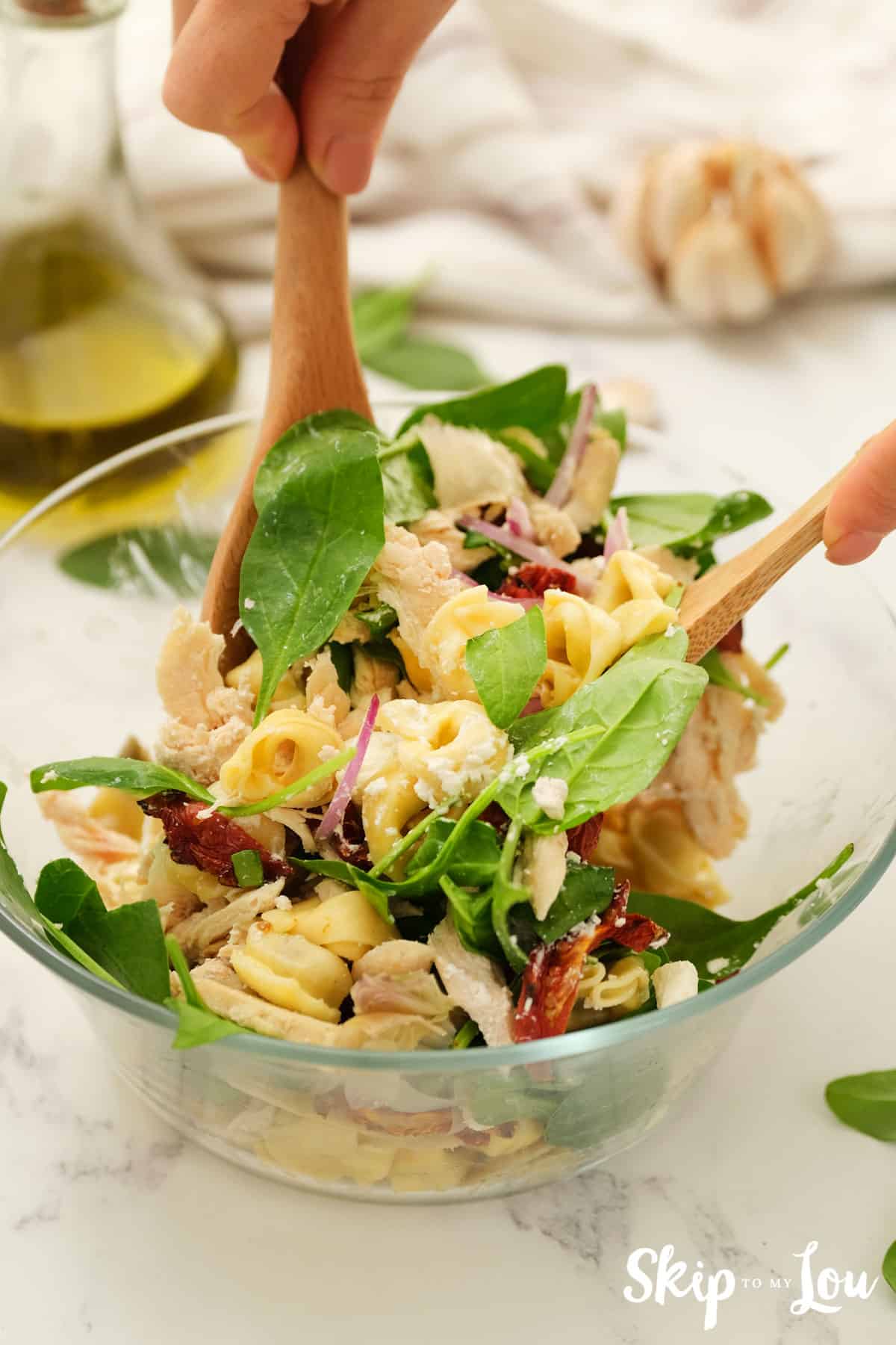Mix tortellini salad ingredients