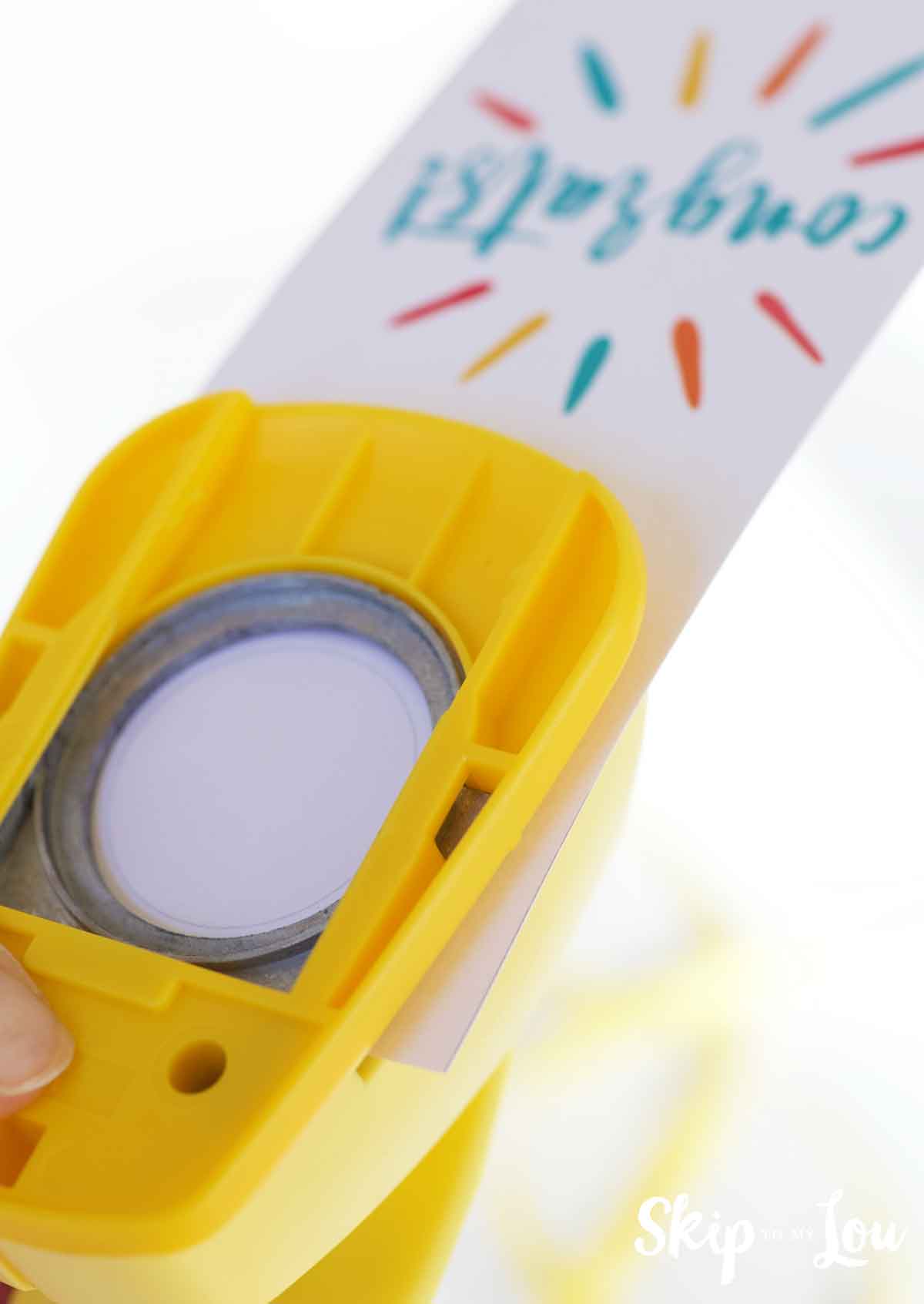 Image shows a wine's bottle neck with a wine tag that says congrats.