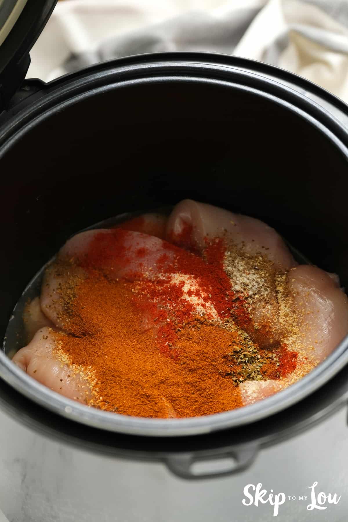 next step add chicken and spices for your Salsa Chicken
