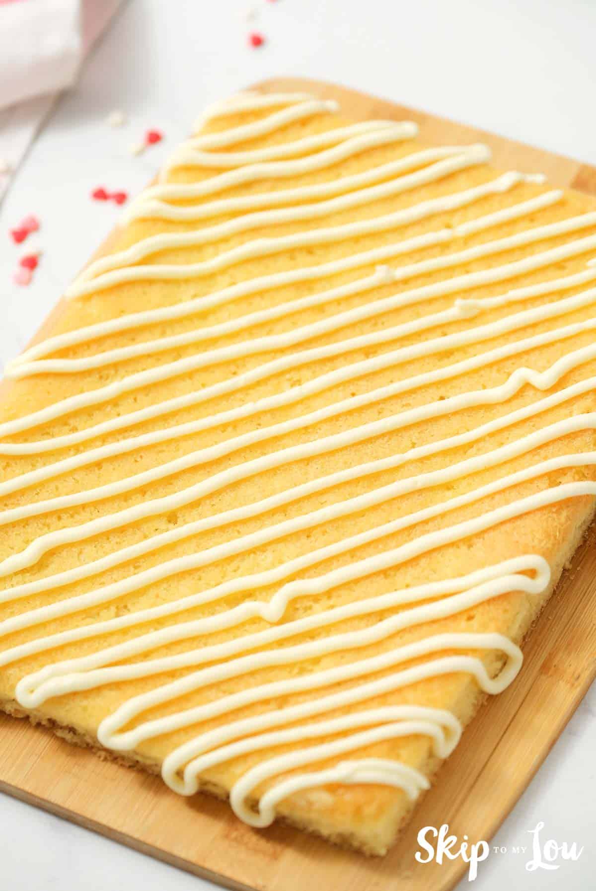 drizzle frosting over sugar cookie bars
