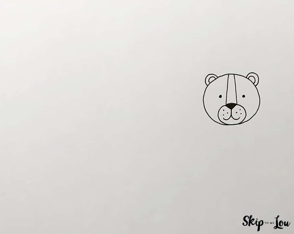 draw head ears and eyes next for how to draw a tiger