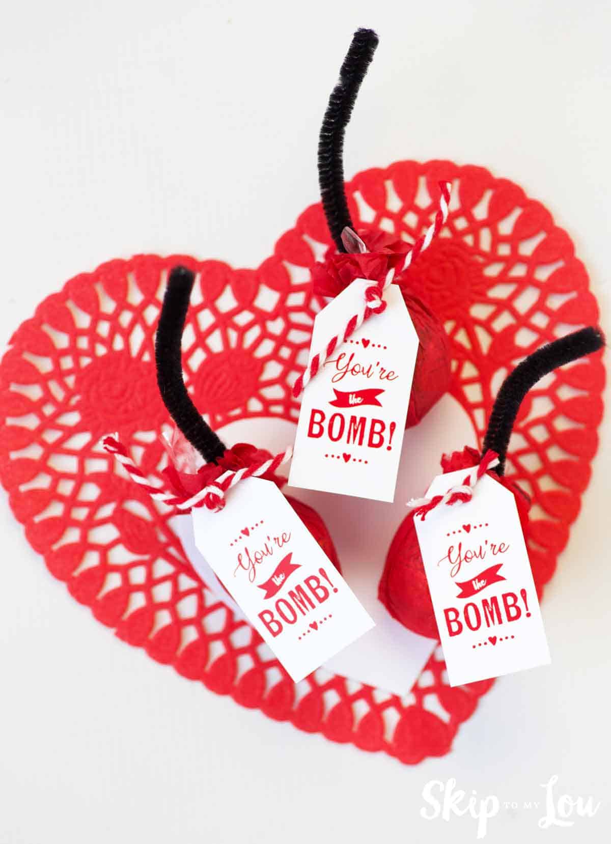 your the bomb favors on heart doily