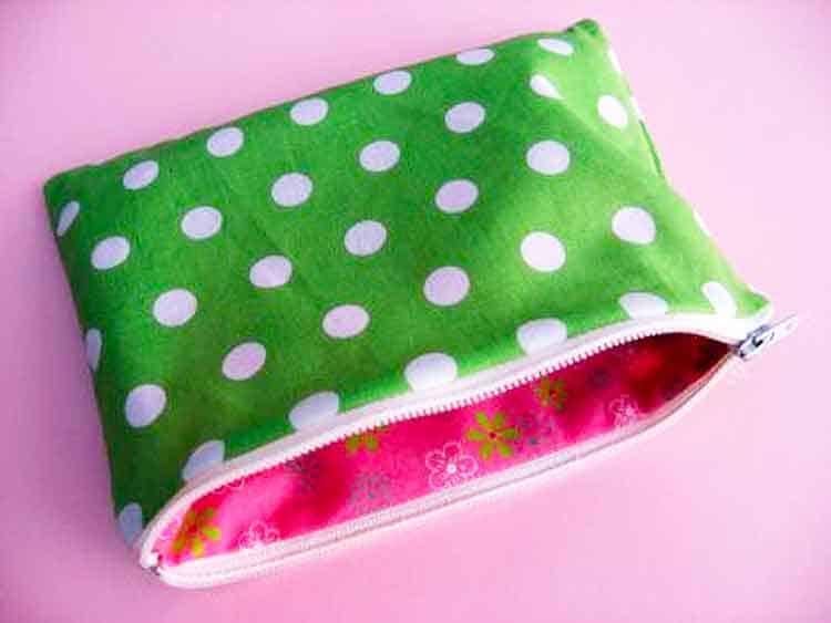 green polka dot zippered pouch