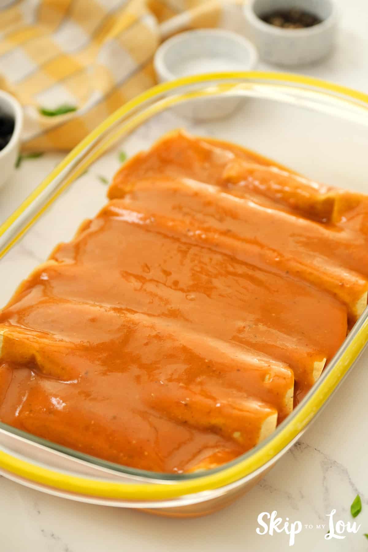 Pour the rest of the sauce over the enchiladas. Then bake your vegan enchiladas