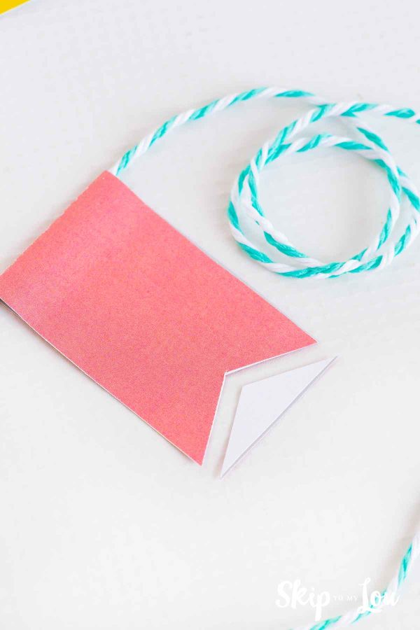 A white triangle trimmed from the bottom of the red rectangle, by Skip to my Lou.