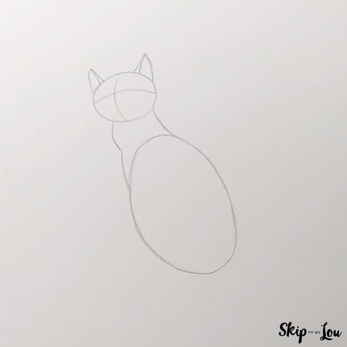 next add ears and lines for face of the cat
