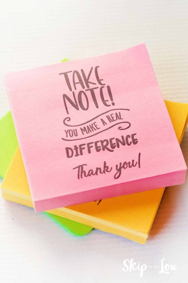 post-it note with printed message take note you make a difference