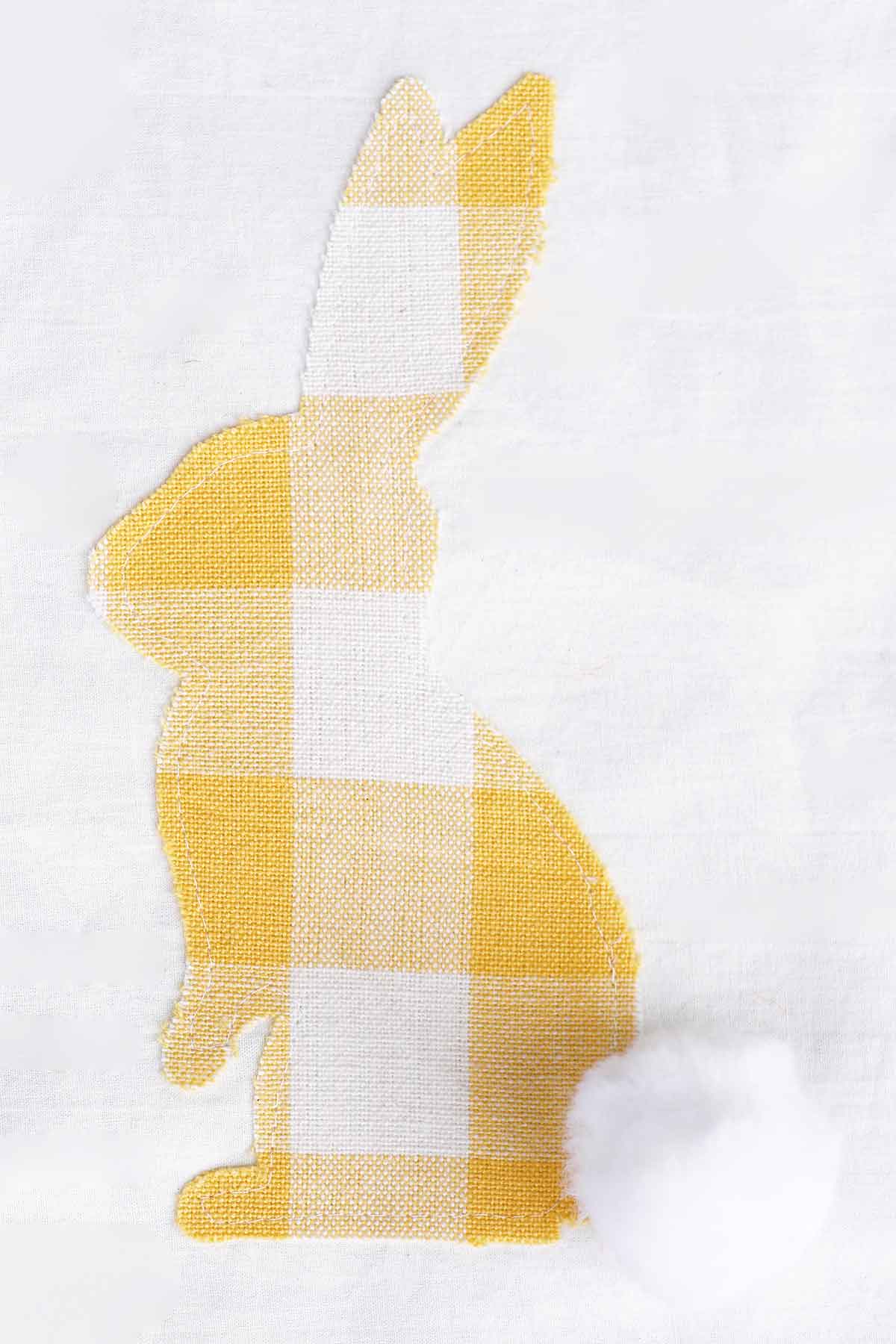 fabric applique bunny with pom pom tail