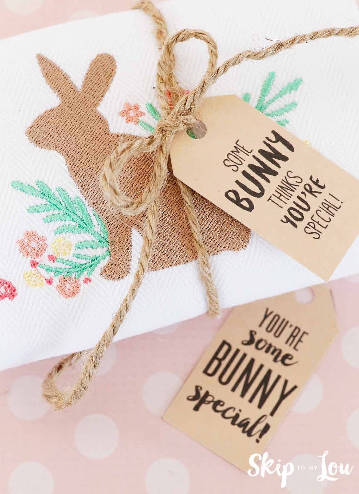 machine embroidered bunny and flowers on tea towel with cute gift tag