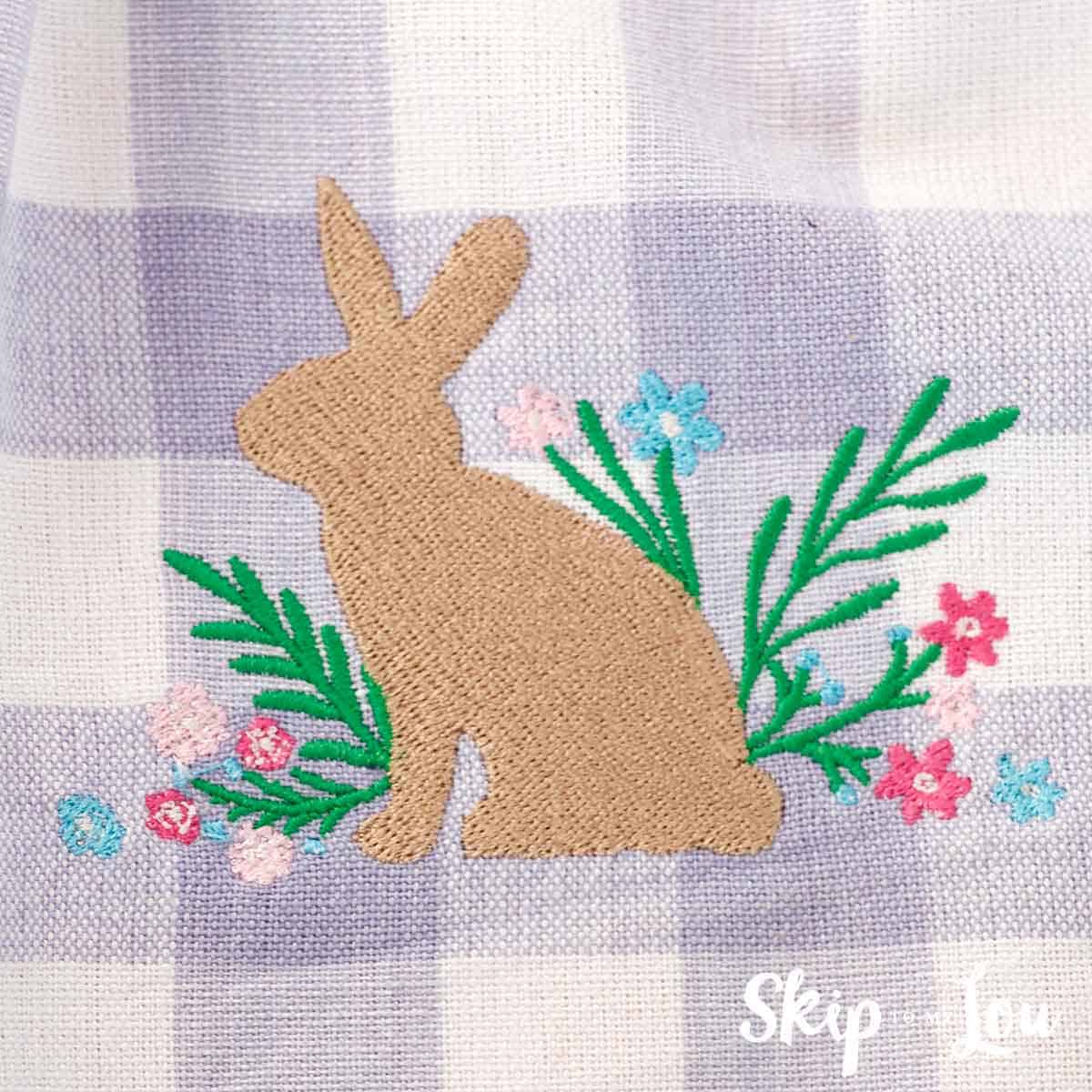 beautiful machine embroidered bunny and flowers on tea towel