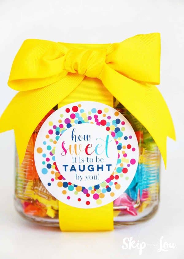 jar filled with candy tied with a large yellow bow label on front that says how sweet it is to be taught by you