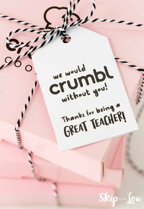 we would crumbl without you teacher tag tied to a crumbl cookie box