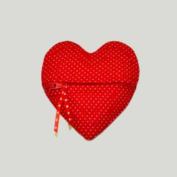 Image shows a red heart-shaped zipper pouch.