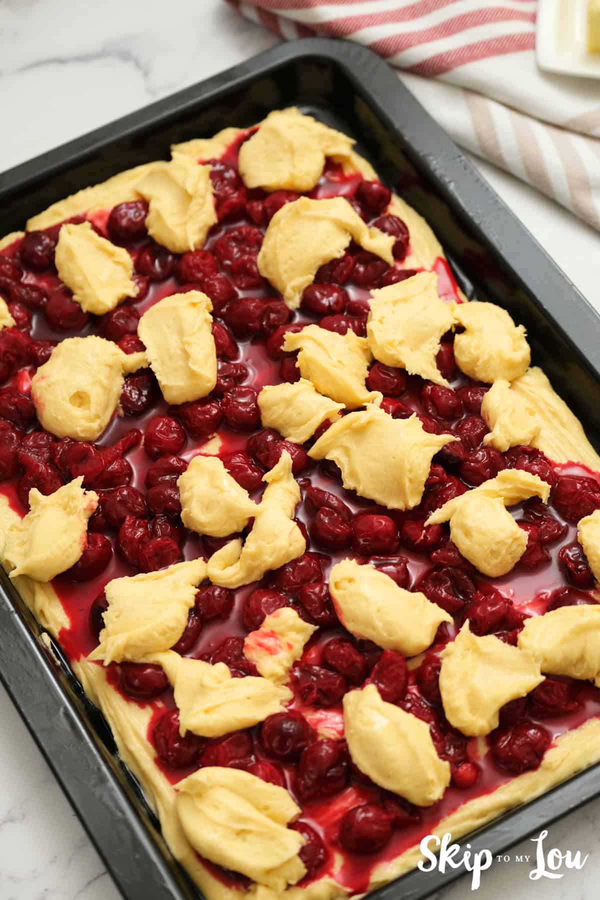 Drop the remaining batter evenly in dollops over pie filling.