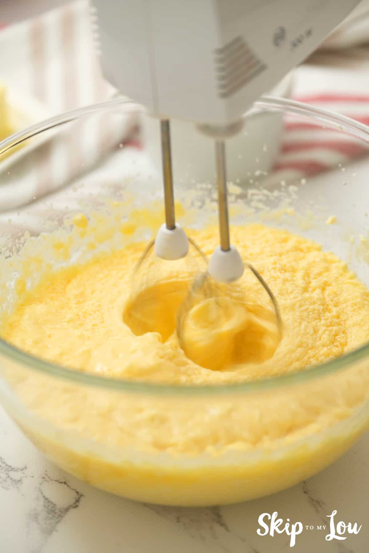 Beat sugar, butter, almond extract & eggs on low until mixed well.