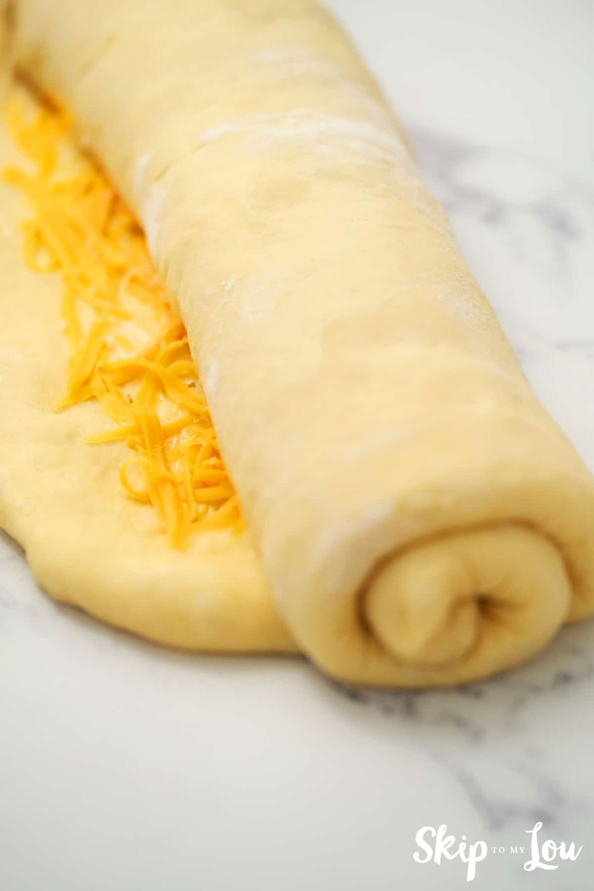 Starting with long side roll up dough.