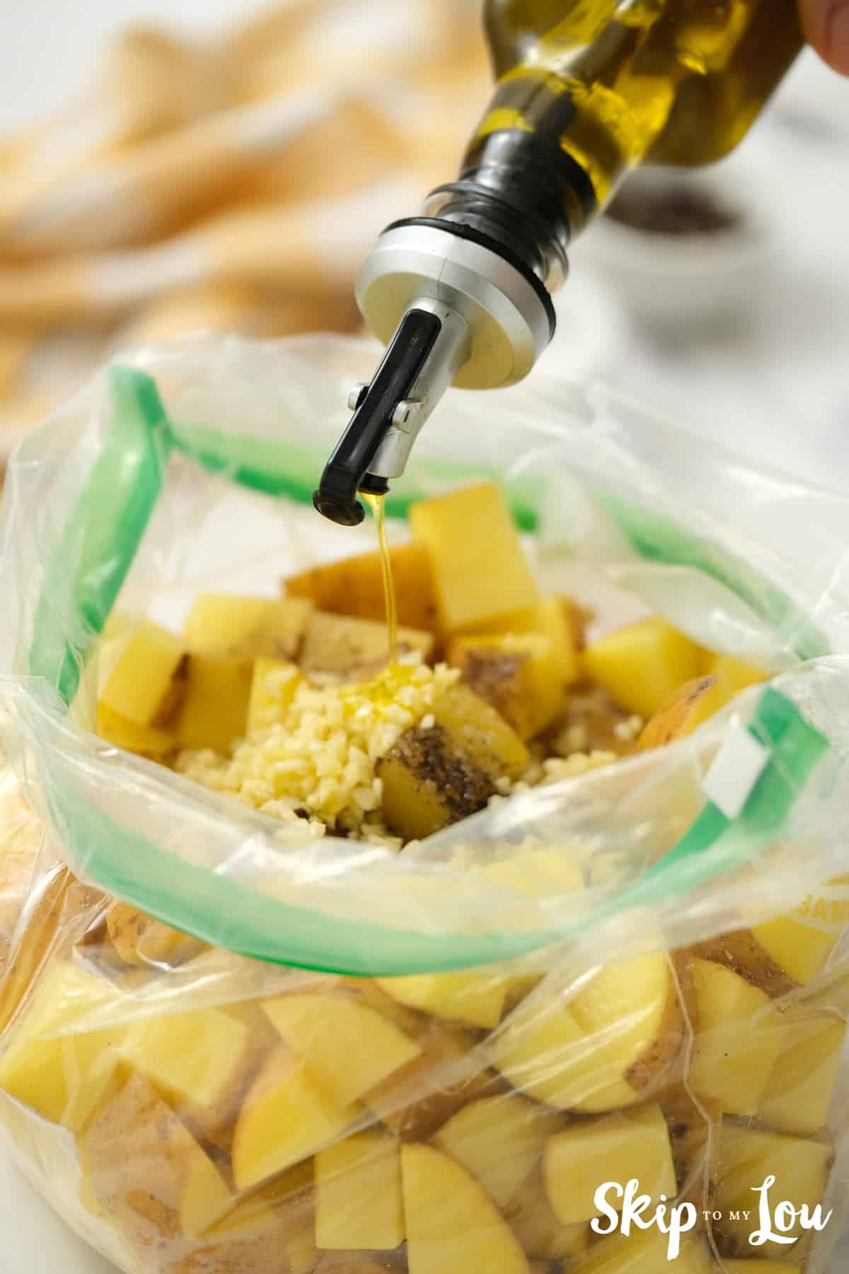 add olive oil to bag