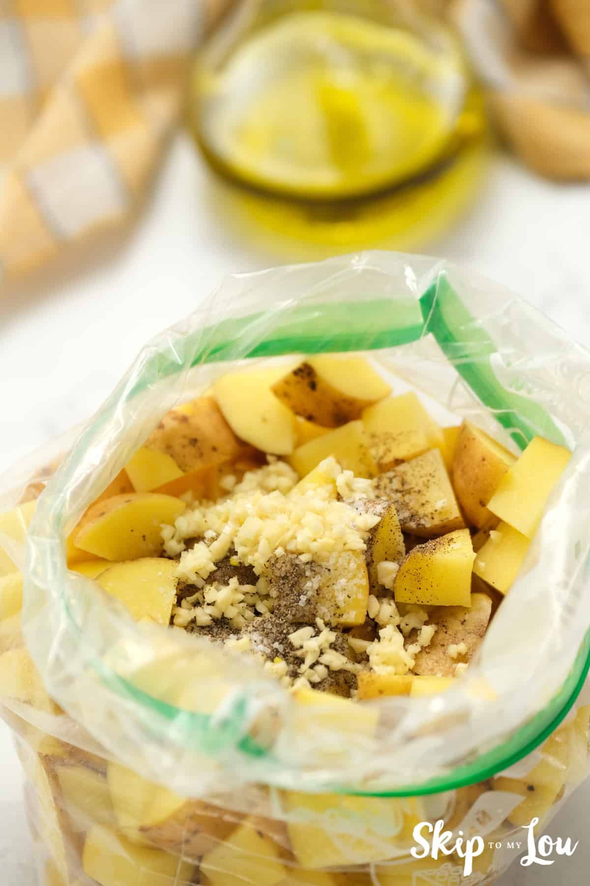 put diced potatoes in ziplock bag with garlic
