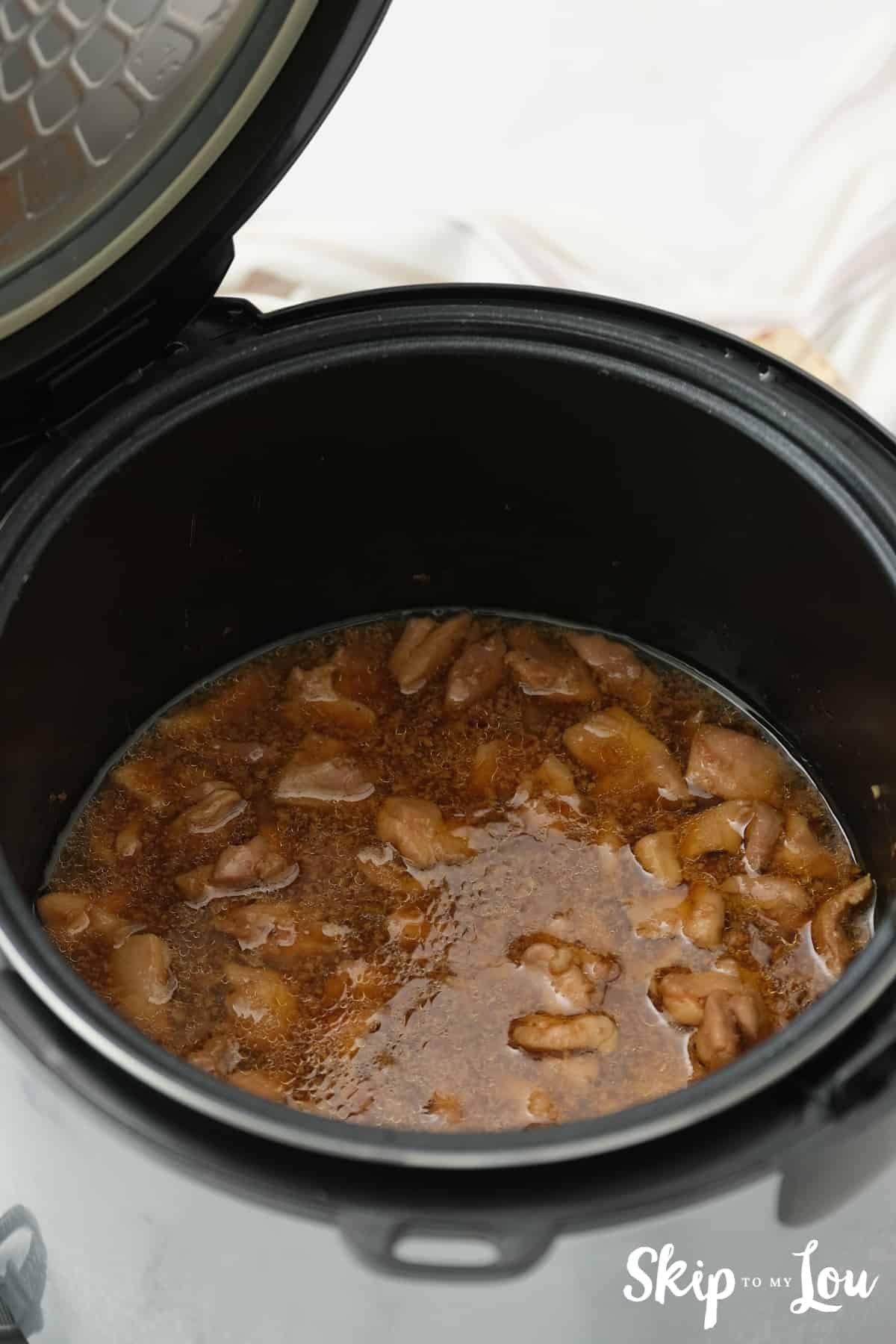 Ingredients for the Instant Pot Honey Chicken ready to cook in the Instant Pot.
